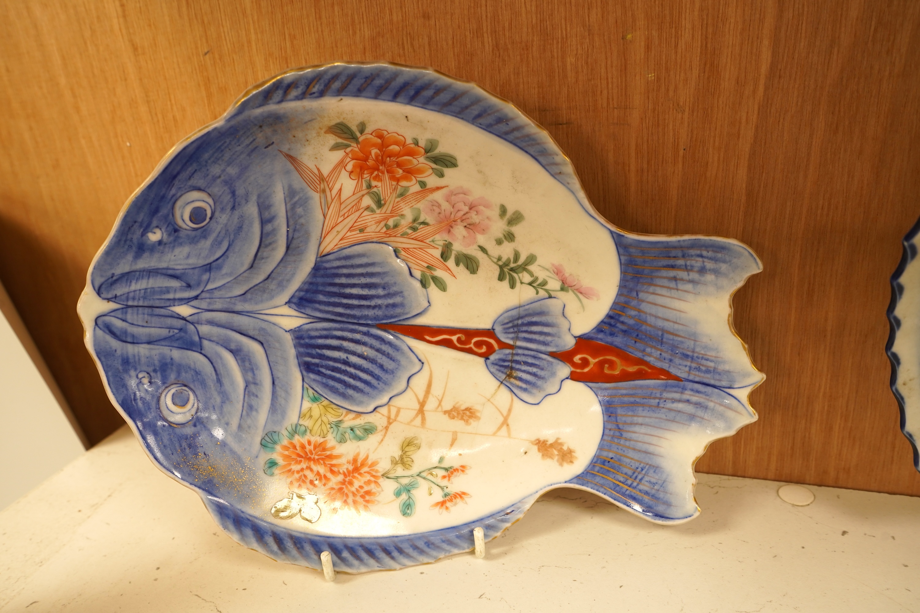 Four Japanese Imari fish-shaped dishes, largest 32cm wide
